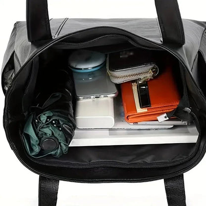 Elegante borsa a tracolla in pelle dallo stile retrò e dalla superficie liscia. 3