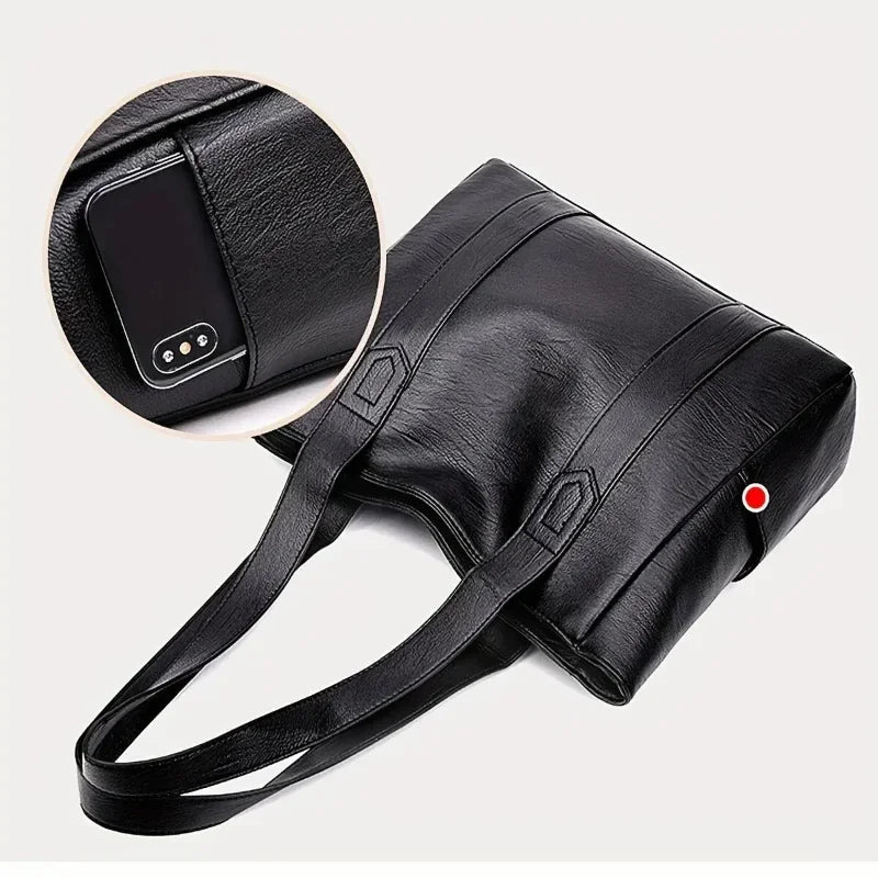 Elegante borsa a tracolla in pelle dallo stile retrò e dalla superficie liscia. 5