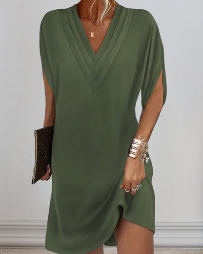 Jansen | Abito elegante con maniche a spacco semplici 0