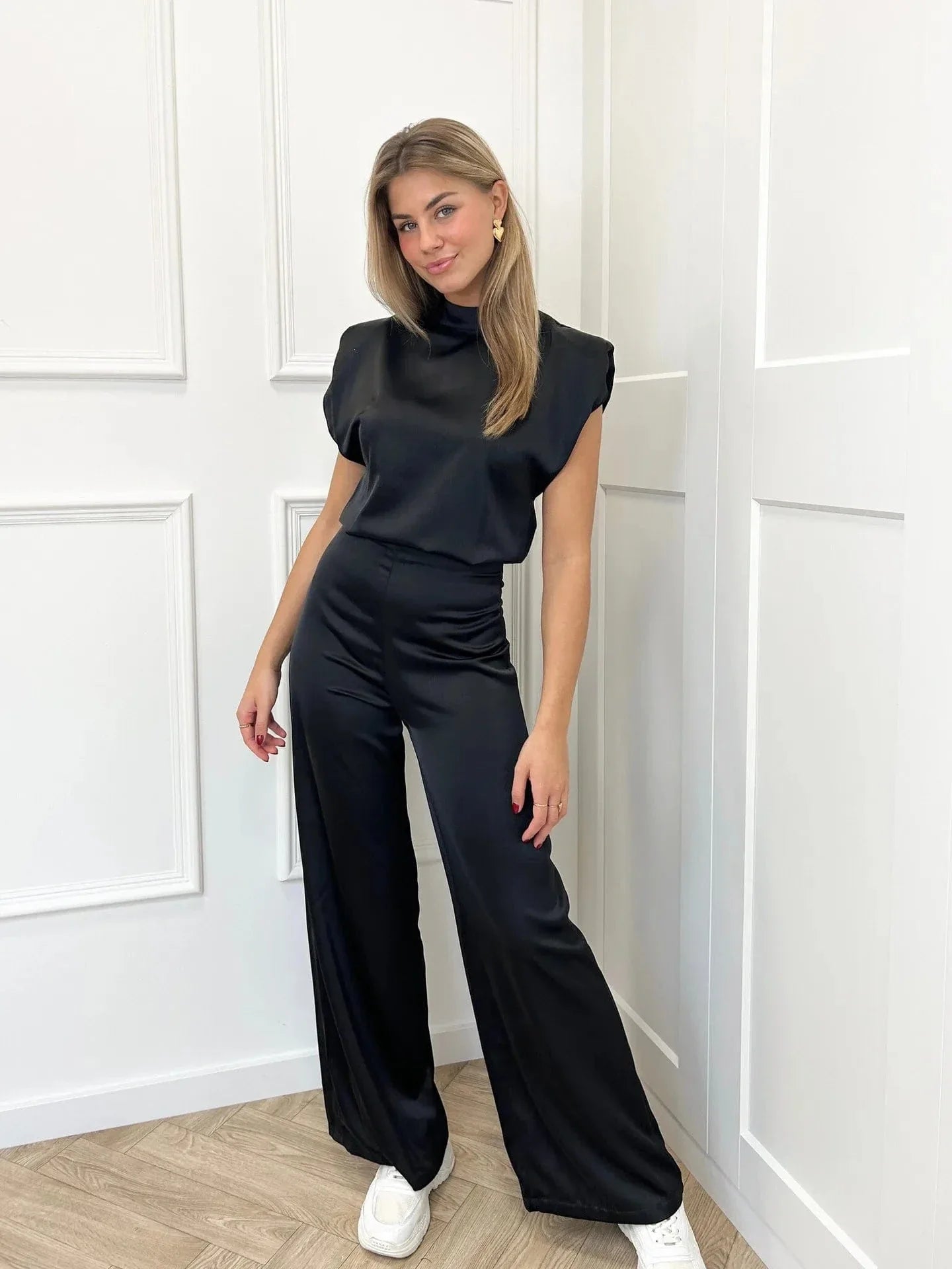 Juna – Elegante tuta senza schienale con gamba larga 0